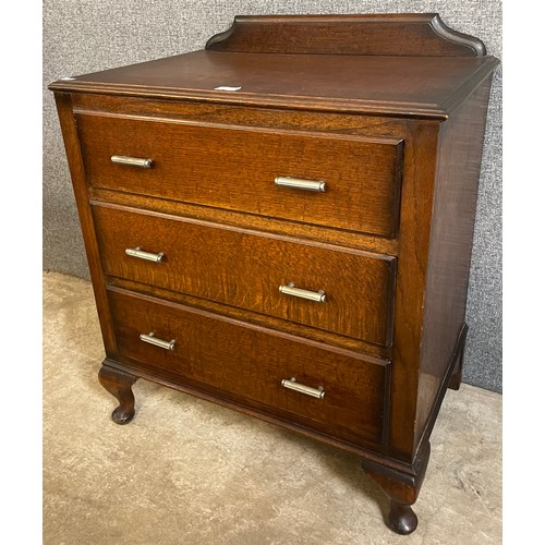 145 - An Art Deco oak chest of drawers