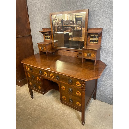 149 - A Liberty & Co. style Arts and Crafts inlaid oak dressing table