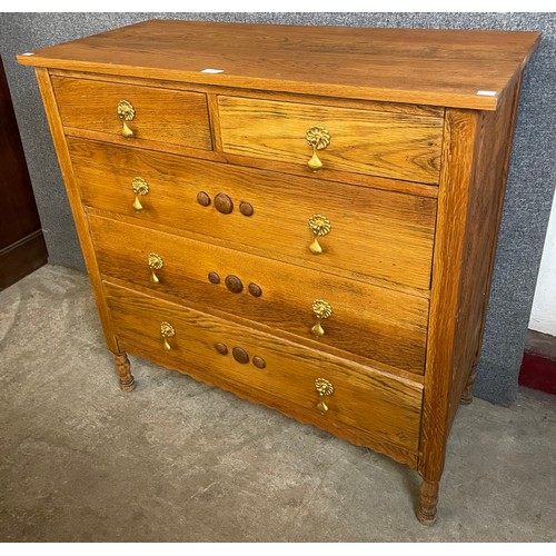 159 - An Arts and Crafts oak chest of drawers