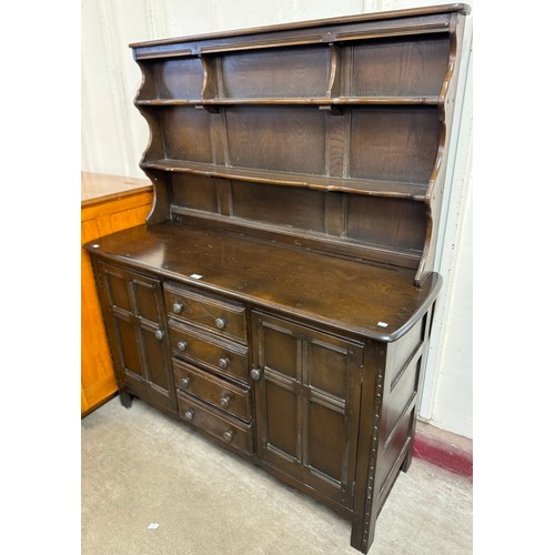 296 - An Ercol dark elm dresser