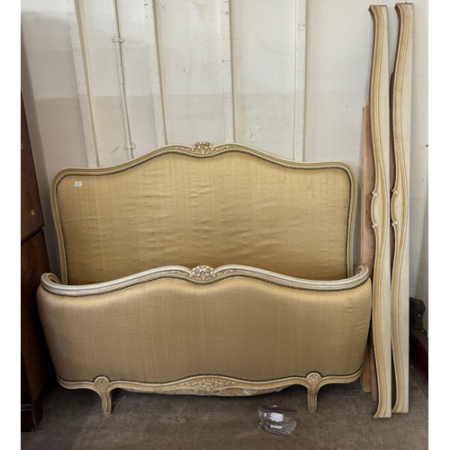 285A - A French Louis XV style cream and fabric upholstered bed