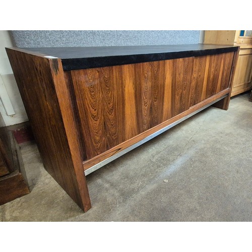 100 - A Merrow Associates rosewood, chrome and black vinyl topped sideboard. CITES A10 no. 24GBA10N1TEFQ