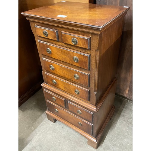 167 - A small George III style mahogany chest on chest