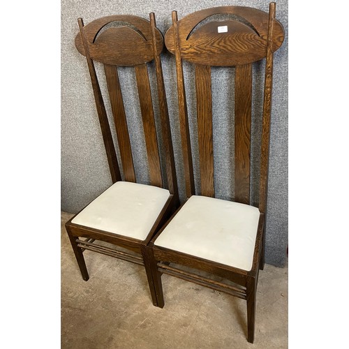 138 - A pair of Charles Rennie Mackintosh style oak Argyle chairs