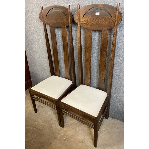 138 - A pair of Charles Rennie Mackintosh style oak Argyle chairs