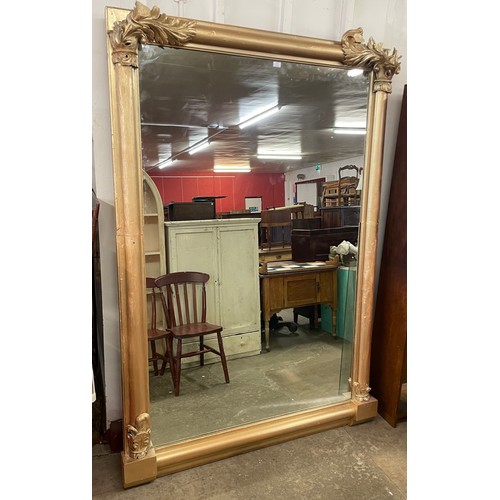 114 - A very large gilt framed mirror, 220 x 150cms