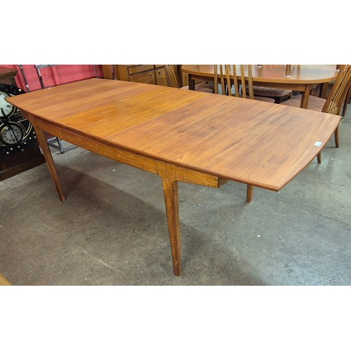 4 - A Danish teak extending dining table