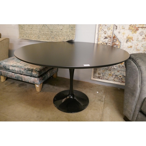 1342 - A black Tulip dining table - RRP £399
