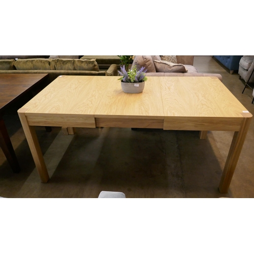 1359 - A Windsor Stockholm extending rectangular dining table  * This lot is subject to VAT RRP £1179
