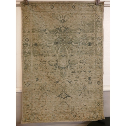 1365 - A green ground vintage look contemporary rug 170 x 120cm