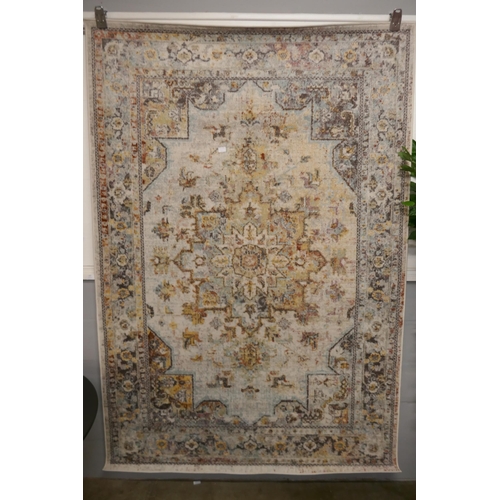 1367 - A Cream ground full pile vintage look rug with hints of duck egg blue (230x160cm)