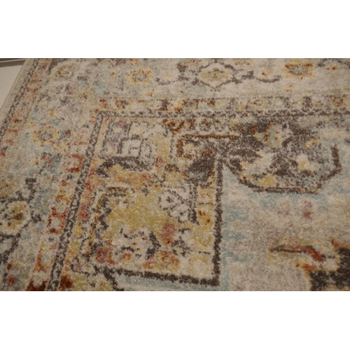 1367 - A Cream ground full pile vintage look rug with hints of duck egg blue (230x160cm)
