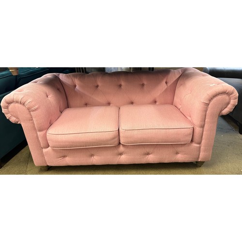 1372 - Pink upholstered Chesterfield three seater sofa RRP £1399