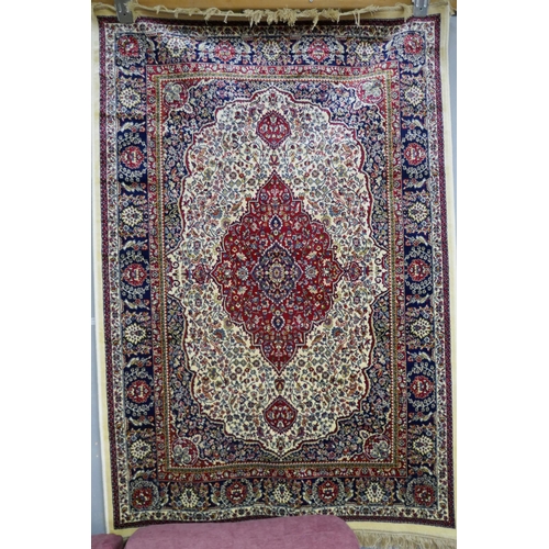 1375 - A rich red ground cashmere rug (95x130cm)