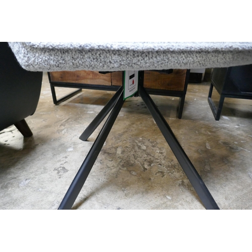 1378 - A hardwood and steel dining table and six boucle swivel chairs  *This lot is subject to VAT