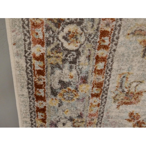1383 - A multi-coloured ground vintage look carpet, 200 x 300cm