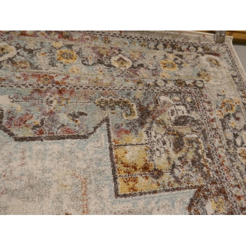 1383 - A multi-coloured ground vintage look carpet, 200 x 300cm