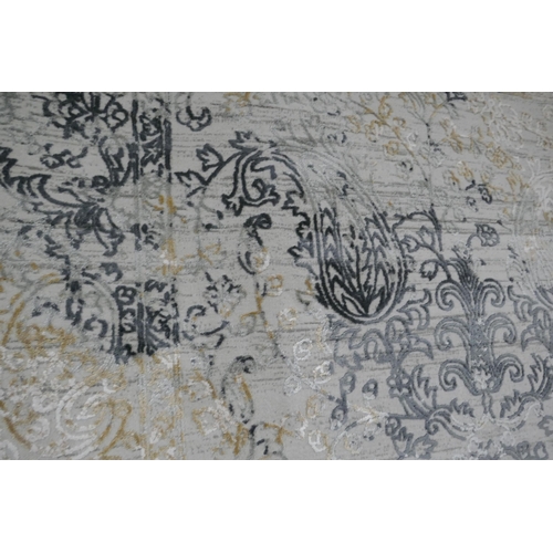 1384 - A full pile grey ground vintage look rug, with a contemporary pattern, 230 x 160cm