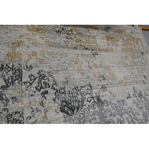 1384 - A full pile grey ground vintage look rug, with a contemporary pattern, 230 x 160cm