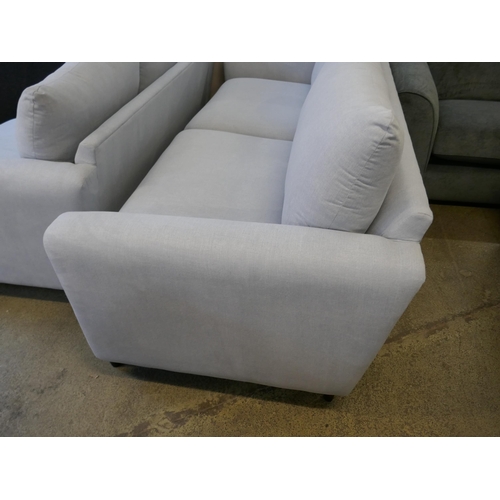 1401 - A sky blue upholstered four seater sofa and three seater sofa on a semi exposed frame RRP £2824