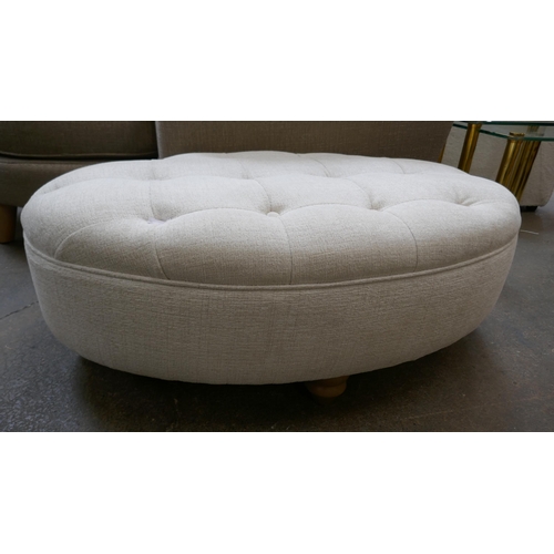 1410 - An oval ivory upholstered footstool