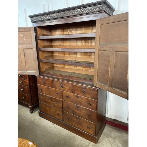 101 - A 17th Century and later carved oak linen press