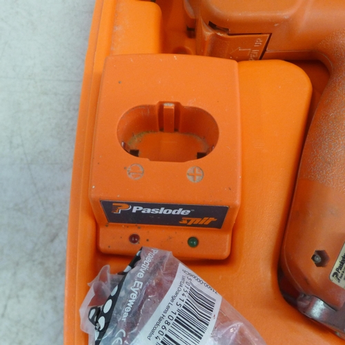2002 - A Paslode Impulse  IM350/90CT first fix nail gun with charger, battery and safety glasses and a quan... 