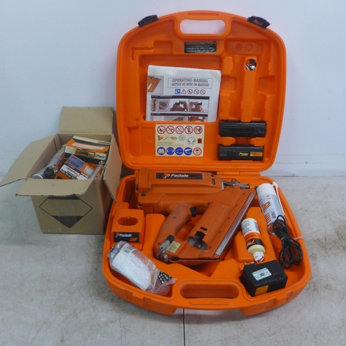 2002 - A Paslode Impulse  IM350/90CT first fix nail gun with charger, battery and safety glasses and a quan... 