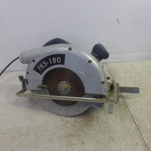 2008 - A Makita MLS-100 240V electric chop saw and a Ferm FKS-180 240v power saw