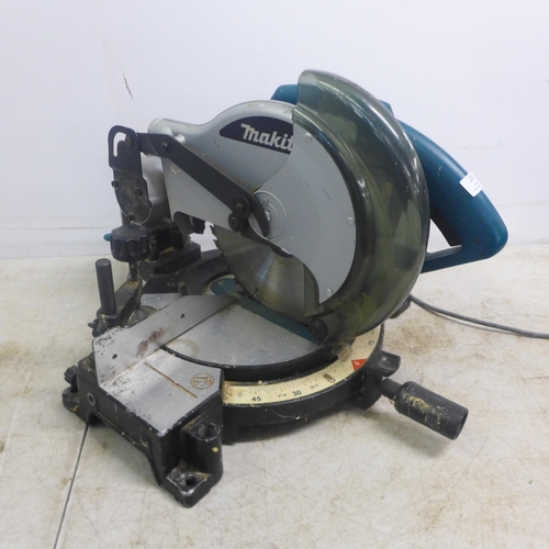 2008 - A Makita MLS-100 240V electric chop saw and a Ferm FKS-180 240v power saw