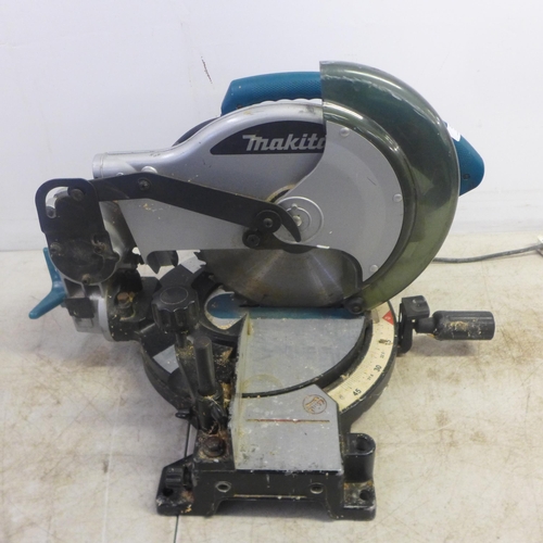 2008 - A Makita MLS-100 240V electric chop saw and a Ferm FKS-180 240v power saw