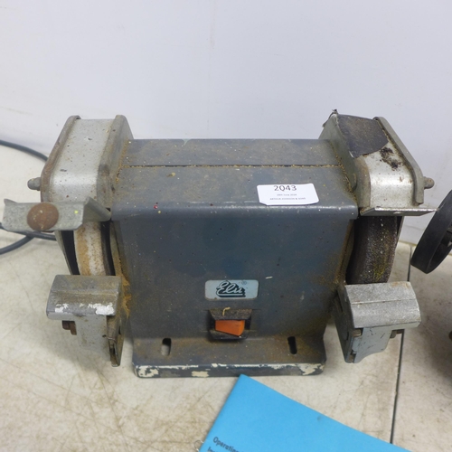 2043 - An ELU MWS 146 220V, 100W double ended bench grinder and a British Thomson-Houston Co Ltd single pha... 