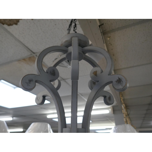 1466 - A Coachhouse six arm grey chandelier