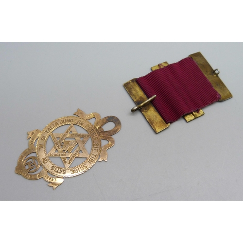 1006 - A 9ct gold Masonic medal, 6g, and a ribbon with three bars