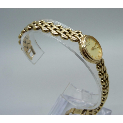 1016 - A lady's 9ct gold dress wristwatch with 9ct gold bracelet strap, total weight 22.6g
