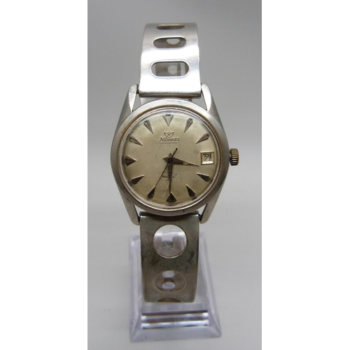 1026 - A Nivada Compensamatic wristwatch, with sweep second hand and date