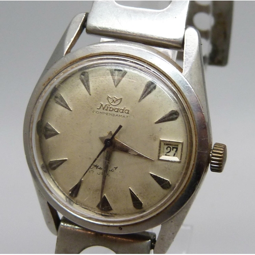 1026 - A Nivada Compensamatic wristwatch, with sweep second hand and date