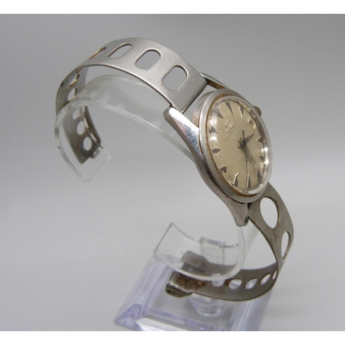 1026 - A Nivada Compensamatic wristwatch, with sweep second hand and date