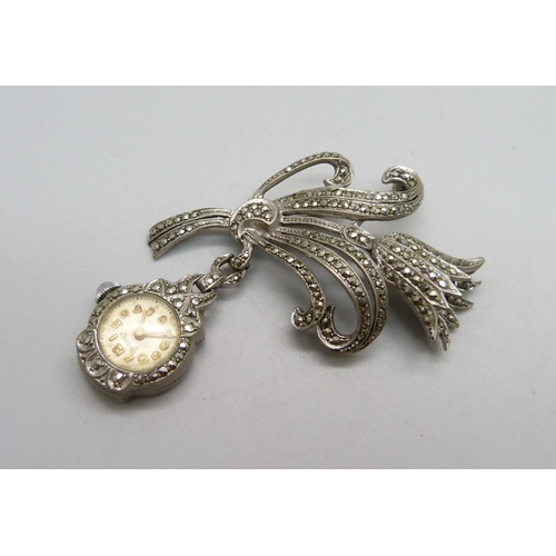 1047 - An Art Deco marcasite set brooch with Premex pendant watch, (one stone missing)