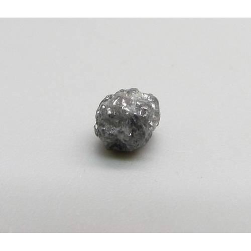 1056 - A rough/uncut diamond, weight 1.15ct