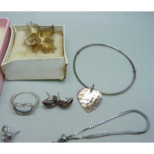 1058 - Two silver filigree brooches, three silver bracelets,  a Pandora ring (a/f), etc.