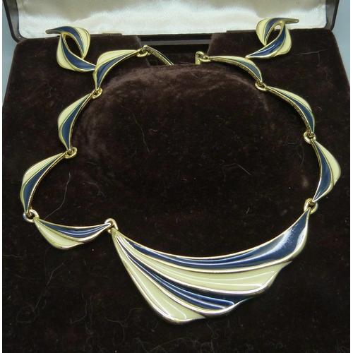 1074 - A 1980s enamelled necklace and earrings, boxed