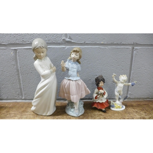 1079 - Seven plates including Doulton Valentine's Day 1976 and two calendar plates, two Nao figures, a cres... 