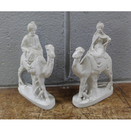 1081 - Carved wooden figures, a pair of bookends, three German figures **PLEASE NOTE THIS LOT IS NOT ELIGIB... 