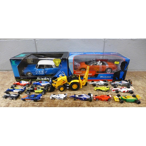 1086 - Two boxed model vehicles, Solido Citroen and a Ford Thunderbird James Bond 007 and a collection of r... 