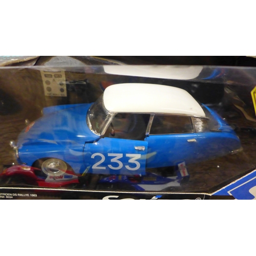 1086 - Two boxed model vehicles, Solido Citroen and a Ford Thunderbird James Bond 007 and a collection of r... 