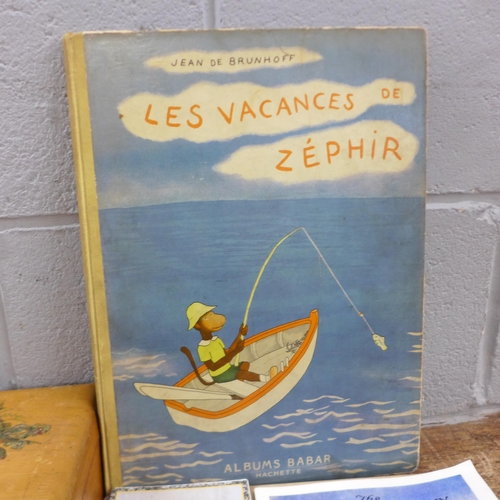 1087 - One volume, Les Vacances de Zephir, a book of Ralph Wood pottery and a box of miscellaneous items **... 