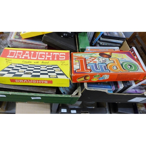 1109 - A box of games, roulette wheel, Ludo and railway DVDs, etc. **PLEASE NOTE THIS LOT IS NOT ELIGIBLE F... 