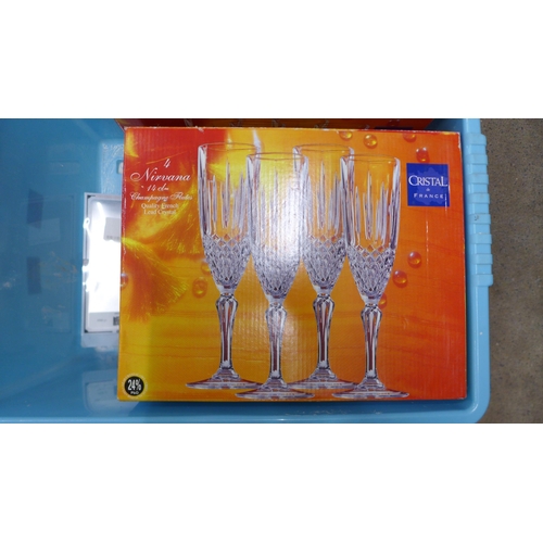 1127 - Four boxes of four Nirvana champagne flutes and a box of crystal glasses **PLEASE NOTE THIS LOT IS N... 