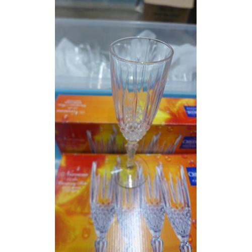 1127 - Four boxes of four Nirvana champagne flutes and a box of crystal glasses **PLEASE NOTE THIS LOT IS N... 